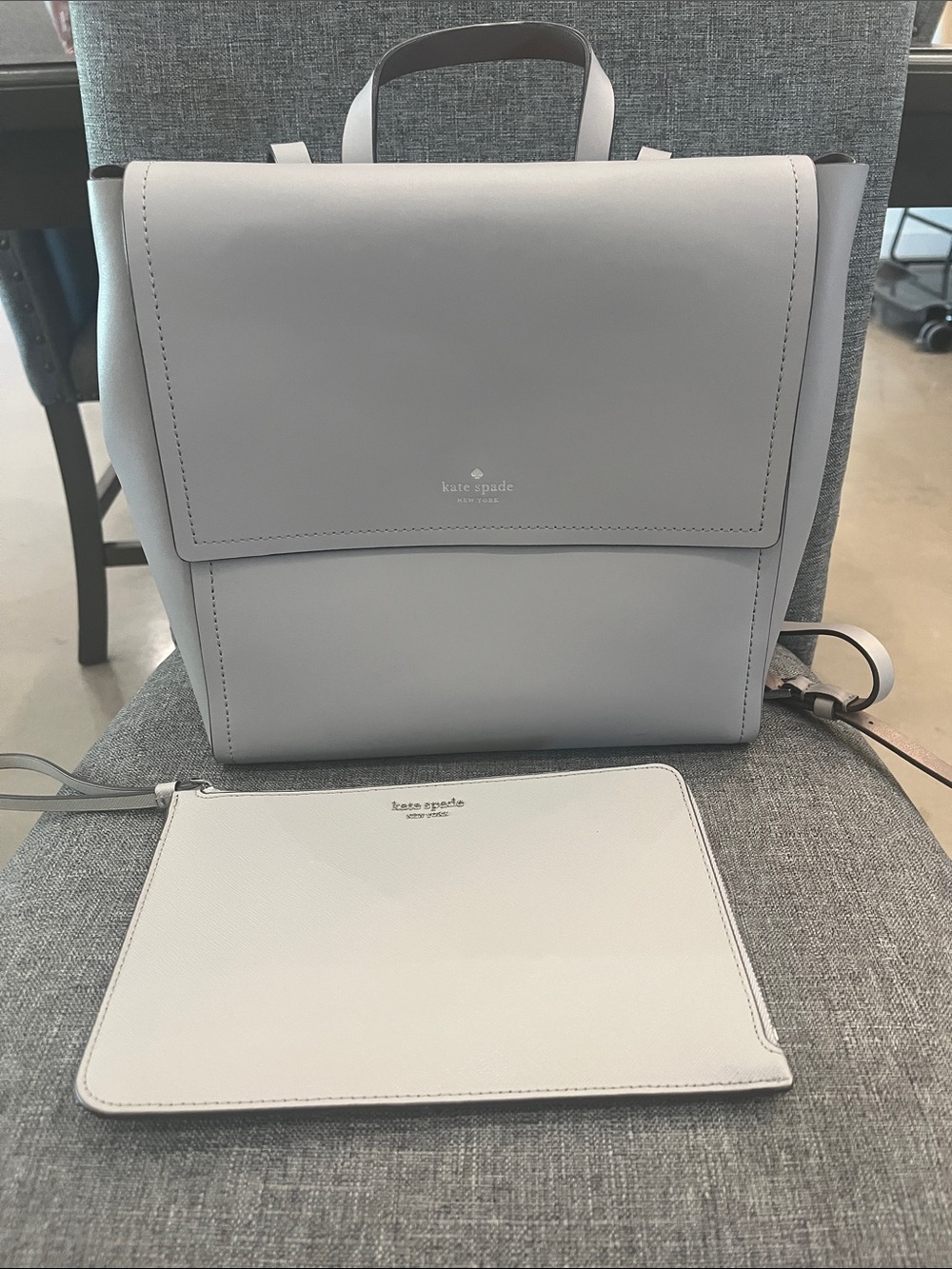 kate spade light gray leather flap backpack with matching wristlet
